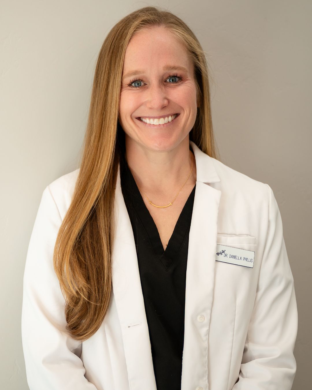 Dr. Daniella Phillis portrait in meet the doctor section at Smile By Design Orthodontics in Durango, Cortez, and Pagosa Springs, CO